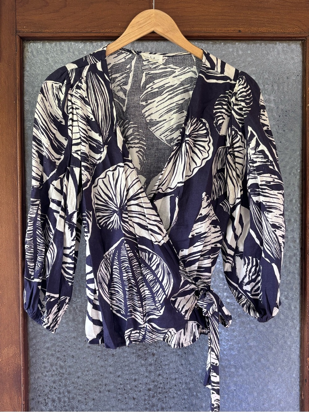 Nicole Miller Black and Cream Botanical Print Wrap Blouse